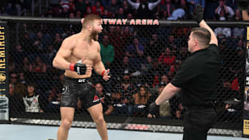 NORFOLK, VA - FEBRUARY 29: (R-L) Referee Kevin MacDonald stops the action between Ion Cutelaba and Magomed Ankalaev in their light heavyweight bout during the UFC Fight Night event at Chartway Arena on February 29, 2020 in Norfolk, Virginia. (Photo by Josh Hedges/Zuffa LLC via Getty Images)