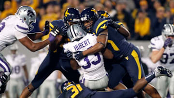 MORGANTOWN, WV - OCTOBER 20: The West Virginia Mountaineers defense stops John Hubert