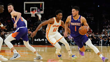 Nov 6, 2021; Phoenix, Arizona, USA; Phoenix Suns guard Devin Booker (1) drives to the basket against the Atlanta Hawks in the first half at Footprint Center. Mandatory Credit: Allan Henry-USA TODAY Sports