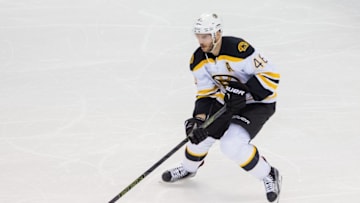 Feb 13, 2016; Saint Paul, MN, USA; Boston Bruins forward David Krejci (46) skates with the puck in the third period against the Minnesota Wild at Xcel Energy Center. The Boston Bruins beat the Minnesota Wild 4-2. Mandatory Credit: Brad Rempel-USA TODAY Sports