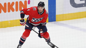 Feb 23, 2021; Washington, District of Columbia, USA; Washington Capitals defenseman Brenden Dillon (4) prepares to shoot the puck against the Pittsburgh Penguins at Capital One Arena. Mandatory Credit: Geoff Burke-USA TODAY Sports
