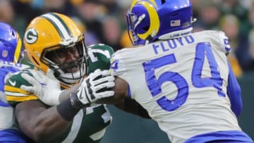 Green Bay Packers offensive tackle Yosh Nijman (73) blocks Los Angeles Rams outside linebacker Leonard Floyd (54) during the first quarter of their game Sunday, November 28, 2021 at Lambeau Field in Green Bay, Wis.n the Green Bay Packers beat the Los Angeles Rams 36-28.Packers29 14