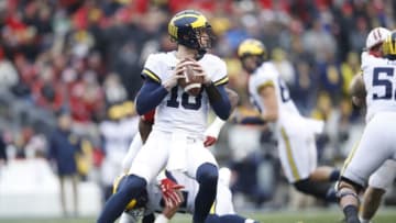 MADISON, WI - NOVEMBER 18: Brandon Peters #18 of the Michigan Wolverines looks to pass during a game against the Wisconsin Badgers at Camp Randall Stadium on November 18, 2017 in Madison, Wisconsin. Wisconsin won 24-10. (Photo by Joe Robbins/Getty Images)