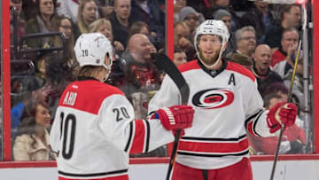Nov 26, 2016; Ottawa, Ontario, CAN; Carolina Hurricanes center Jordan Staal (11) celebrates a goal scored by right wing Sebastien Aho (20) in the first period against Ottawa Senators at Canadian Tire Centre. Mandatory Credit: Marc DesRosiers-USA TODAY Sports
