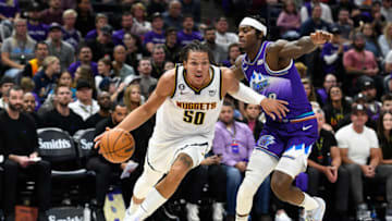 Aaron Gordon #50 of the Denver Nuggets drives around Jarred Vanderbilt #8 of the Utah Jazz during a game at Vivint Arena. (Photo by Alex Goodlett/Getty Images)