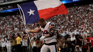 HOUSTON, TX - SEPTEMBER 10: J.J. Watt #99 of the Houston Texans enters the field with Texas flag against the Jacksonville Jaguars at NRG Stadium on September 10, 2017 in Houston, Texas. (Photo by Tim Warner/Getty Images)