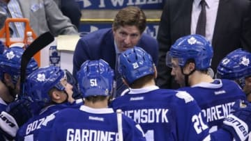 Nov 23, 2015; Toronto, Ontario, CAN; Toronto Maple Leafs head coach Mike Babcock talks to his players during a timeout against the Boston Bruins at Air Canada Centre. The Bruins beat the Maple Leafs 4-3 in the shootout. Mandatory Credit: Tom Szczerbowski-USA TODAY Sports