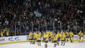 VICTORIA , BC - DECEMBER 29: Team Sweden celebrates following an overtime win versus the United States at the IIHF World Junior Championships at the Save-on-Foods Memorial Centre on December 29, 2018 in Victoria, British Columbia, Canada. (Photo by Kevin Light/Getty Images)
