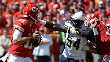 Sep 11, 2016; Kansas City, MO, USA; Kansas City Chiefs quarterback Alex Smith (11) looks to pass against the San Diego Chargers in the first half at Arrowhead Stadium. Mandatory Credit: John Rieger-USA TODAY Sports