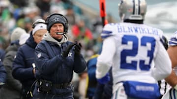 PHILADELPHIA, PA - DECEMBER 31: Head coach Jason Garrett of the Dallas Cowboys claps as defensive back Bene' Benwikere #23 runs off the field against the Philadelphia Eagles during the first half of the game at Lincoln Financial Field on December 31, 2017 in Philadelphia, Pennsylvania. (Photo by Elsa/Getty Images)