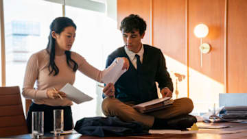 Partner Track. (L to R) Arden Cho as Ingrid Yun, Roby Attal as Justin in episode 101 of Partner Track. Cr. Vanessa Clifton/Netflix © 2022