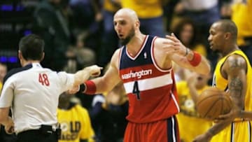 May 5, 2014; Indianapolis, IN, USA; Washington Wizards center Marcin Gortat (4) reacts to a foul being called and is called for a technical foul against the Indiana Pacers in game one of the second round of the 2014 NBA Playoffs at Bankers Life Fieldhouse. Washington defeats Indiana 102-96. Mandatory Credit: Brian Spurlock-USA TODAY Sports
