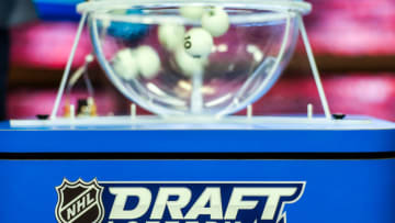 The lottery balls spin in the machine during The National Hockey League Draft Lottery . (Photo by Kevin Sousa/NHLI via Getty Images)