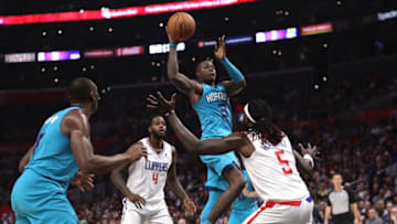 LOS ANGELES, CALIFORNIA - OCTOBER 28: Terry Rozier #3 of the Charlotte Hornets shoots over the defense of Montrezl Harrell #5 and JaMychal Green #4 of the Los Angeles Clippers during the second half of a game at Staples Center on October 28, 2019 in Los Angeles, California. NOTE TO USER: User expressly acknowledges and agrees that, by downloading and or using this photograph, User is consenting to the terms and conditions of the Getty Images License Agreement. (Photo by Sean M. Haffey/Getty Images)