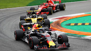 MONZA, ITALY - SEPTEMBER 02: Daniel Ricciardo of Australia driving the (3) Aston Martin Red Bull Racing RB14 TAG Heuer leads Nico Hulkenberg of Germany driving the (27) Renault Sport Formula One Team RS18 and Sebastian Vettel of Germany driving the (5) Scuderia Ferrari SF71H on track during the Formula One Grand Prix of Italy at Autodromo di Monza on September 2, 2018 in Monza, Italy. (Photo by Mark Thompson/Getty Images)