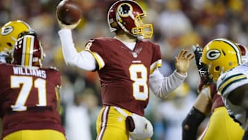 Jan 10, 2016; Landover, MD, USA; Washington Redskins quarterback Kirk Cousins (8) throws the ball against the Green Bay Packers during the first half in a NFC Wild Card playoff football game at FedEx Field. Mandatory Credit: Tommy Gilligan-USA TODAY Sports