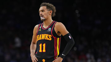 PHILADELPHIA, PA - NOVEMBER 12: Trae Young #11 of the Atlanta Hawks looks on against the Philadelphia 76ers at the Wells Fargo Center on November 12, 2022 in Philadelphia, Pennsylvania. NOTE TO USER: User expressly acknowledges and agrees that, by downloading and or using this photograph, User is consenting to the terms and conditions of the Getty Images License Agreement. (Photo by Mitchell Leff/Getty Images)