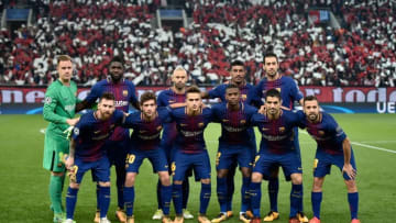 Barcelona team (first row LtoR) Barcelona's Argentinian forward Lionel Messi, Barcelona's Spanish midfielder Sergi Roberto, Barcelona's Spanish midfielder Denis Suarez, Barcelona's Portuguese defender Nelson Semedo, Barcelona's Uruguayan forward Luis Suarez, Barcelona's Spanish defender Jordi Alba (second row LtoR) Barcelona's German goalkeeper Marc-Andre Ter Stegen, Barcelona's French defender Samuel Umtiti, Barcelona's Argentinian defender Javier Mascherano, Barcelona's Brazilian midfielder Paulinho and Barcelona's Spanish midfielder Sergio Busquets, pose prior to the UEFA Champions League group D football match between FC Barcelona and Olympiakos FC at the Karaiskakis stadium in Piraeus near Athens on October 31, 2017. / AFP PHOTO / Louisa GOULIAMAKI (Photo credit should read LOUISA GOULIAMAKI/AFP/Getty Images)