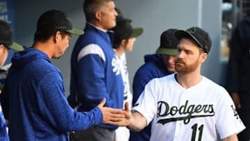 LOS ANGELES, CA - MAY 26: Kenta Maeda #18 and Logan Forsythe #11 of the Los Angeles Dodgers in the dugout before the start of the game against the San Diego Padres Dodger Stadium on May 26, 2018 in Los Angeles, California. (Photo by Jayne Kamin-Oncea/Getty Images)