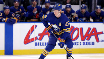 Apr 16, 2022; Buffalo, New York, USA; Buffalo Sabres defenseman Rasmus Dahlin (26) looks to make a pass during the second period against the Philadelphia Flyers at KeyBank Center. Mandatory Credit: Timothy T. Ludwig-USA TODAY Sports