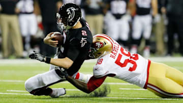 ATLANTA, GA - DECEMBER 18: Matt Ryan #2 of the Atlanta Falcons slides past Eli Harold #58 of the San Francisco 49ers during the first half at the Georgia Dome on December 18, 2016 in Atlanta, Georgia. (Photo by Kevin C. Cox/Getty Images)