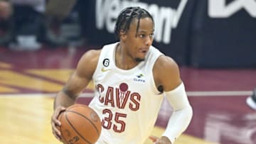 Dec 21, 2022; Cleveland, Ohio, USA; Cleveland Cavaliers forward Isaac Okoro (35) dribbles the ball in the first quarter against the Milwaukee Bucks at Rocket Mortgage FieldHouse. Mandatory Credit: David Richard-USA TODAY Sports