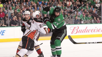 DALLAS, TX - MARCH 9: Jamie Benn #14 of the Dallas Stars fights for position against Francois Beauchemin #23 of the Anaheim Ducks at the American Airlines Center on March 9, 2018 in Dallas, Texas. (Photo by Glenn James/NHLI via Getty Images)