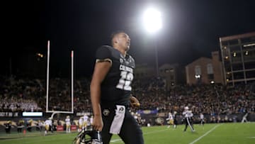 BOULDER, CO - SEPTEMBER 28: Quarterback Steven Montez #12 of the Colorado Buffaloes jogs back to the bench after carrying the ball for a touchdown in the fourth quarter against the UCLA Bruins at Folsom Field on September 28, 2018 in Boulder, Colorado. (Photo by Matthew Stockman/Getty Images)