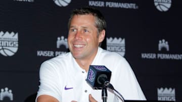 SACRAMENTO, CA - JUNE 23: Head Coach Dave Joerger looks on as Marvin Bagley III of the Sacramento Kings is introduced to the media on June 23, 2018 at the Golden 1 Center in Sacramento, California. NOTE TO USER: User expressly acknowledges and agrees that, by downloading and/or using this Photograph, user is consenting to the terms and conditions of the Getty Images License Agreement. Mandatory Copyright Notice: Copyright 2017 NBAE (Photo by Rocky Widner/NBAE via Getty Images)Dave Joerger