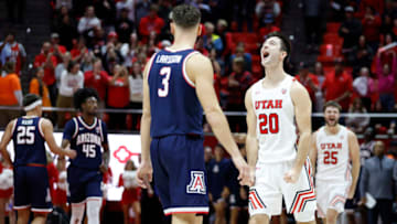 Dec 1, 2022; Salt Lake City, Utah, USA; Utah Utes guard Lazar Stefanovic (20) celebrates their win against the Arizona Wildcats at Jon M. Huntsman Center. Mandatory Credit: Jeffrey Swinger-USA TODAY Sports