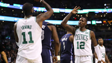 BOSTON, MA - DECEMBER 6: Kyrie Irving #11 of the Boston Celtics and Terry Rozier #12 celebrate during the second half against the Dallas Mavericks at TD Garden on December 6, 2017 in Boston, Massachusetts. The Celtics defeat the Mavericks 97-90. (Photo by Maddie Meyer/Getty Images)