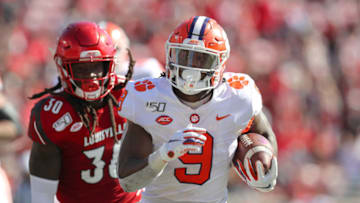 LOUISVILLE, KY - OCTOBER 19: Clemson Tigers running back Travis Etienne (9) carries the football during the fourth quarter of the college football game between the Clemson Tigers and Louisville Cardinals on October 19, 2019, at Cardinal Stadium in Louisville, KY. (Photo by Frank Jansky/Icon Sportswire via Getty Images)