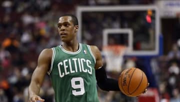 Feb 5, 2014; Philadelphia, PA, USA; Boston Celtics guard Rajon Rondo (9) brings the ball up court during the third quarter against the Philadelphia 76ers at the Wells Fargo Center. The Celtics defeated the Sixers 114-108. Mandatory Credit: Howard Smith-USA TODAY Sports
