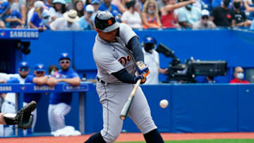 Aug 22, 2021; Toronto, Ontario, CAN; Detroit Tigers designated hitter Miguel Cabrera (24) hits a solo homerun against the Toronto Blue Jays in the sixth inning at Rogers Centre. The homerun was the 500th of his career. Mandatory Credit: John E. Sokolowski-USA TODAY Sports