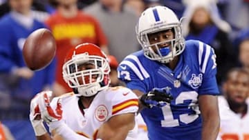 Jan 4, 2014; Indianapolis, IN, USA; Kansas City Chiefs cornerback Marcus Cooper (31) defends a pass intended for Indianapolis Colts receiver T.Y. Hilton (13) during the 2013 AFC wild card playoff football game at Lucas Oil Stadium. Mandatory Credit: Thomas J. Russo-USA TODAY Sports