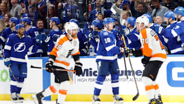 Nov 23, 2021; Tampa, Florida, USA; Tampa Bay Lightning right wing Corey Perry (10) is congratulated as he scores a goal against the Philadelphia Flyers during the second period at Amalie Arena. Mandatory Credit: Kim Klement-USA TODAY Sports