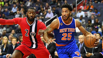Nov 17, 2016; Washington, DC, USA; New York Knicks guard Derrick Rose (25) dribbles past Washington Wizards guard John Wall (2) during the first half at Verizon Center. Mandatory Credit: Brad Mills-USA TODAY Sports