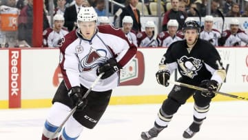 Nov 19, 2015; Pittsburgh, PA, USA; Colorado Avalanche center Nathan MacKinnon (29) skates with the puck as of Pittsburgh Penguins center Nick Bonino (13) chases during the first period at the CONSOL Energy Center. Mandatory Credit: Charles LeClaire-USA TODAY Sports