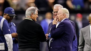Dec 2, 2021; New Orleans, Louisiana, USA; Executive vice president and General manager of the New Orleans Saints Mickey Loomis shares a moment with the owner of the Dallas Cowboys Jerry jones during warmups at Caesars Superdome. Mandatory Credit: Stephen Lew-USA TODAY Sports