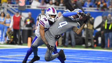 Nov 24, 2022; Detroit, Michigan, USA; Detroit Lions wide receiver DJ Chark (4) catches a touchdown pass from quarterback Jared Goff (16) (not pictured) against the Buffalo Bills in the fourth quarter at Ford Field. Mandatory Credit: Lon Horwedel-USA TODAY Sports