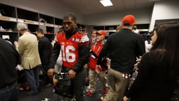 Jan 12, 2015; Arlington, TX, USA; Ohio State Buckeyes quarterback J.T. Barrett (16) in the locker room after defeating the Oregon Ducks in the 2015 CFP National Championship Game at AT&T Stadium. Mandatory Credit: Matthew Emmons-USA TODAY Sports