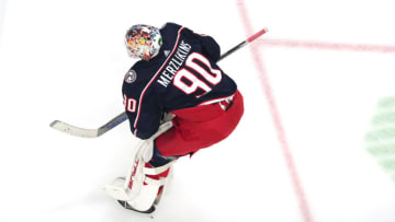 COLUMBUS, OHIO - NOVEMBER 27: Elvis Merzlikins #90 of the Columbus Blue Jackets warms up prior to a game against Boston Bruins at Nationwide Arena on November 27, 2023 in Columbus, Ohio. (Photo by Jason Mowry/Getty Images)
