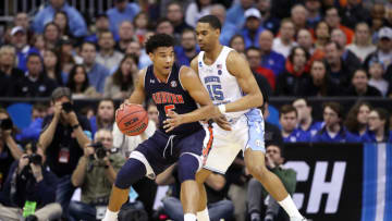 KANSAS CITY, MISSOURI - MARCH 29: Chuma Okeke #5 of the Auburn Tigers handles the ball against Garrison Brooks #15 of the North Carolina Tar Heels during the 2019 NCAA Basketball Tournament Midwest Regional at Sprint Center on March 29, 2019 in Kansas City, Missouri. (Photo by Christian Petersen/Getty Images)