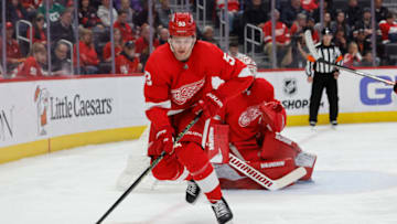 Mar 30, 2023; Detroit, Michigan, USA; Detroit Red Wings defenseman Moritz Seider (53) skates with the puck in the first period against the Carolina Hurricanes at Little Caesars Arena. Mandatory Credit: Rick Osentoski-USA TODAY Sports