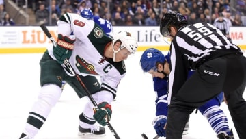 Mar 3, 2016; Toronto, Ontario, CAN; Minnesota Wild center Mikko Koivu (9) takes a faceoff against Toronto Maple Leafs center William Nylander (39) in the second period at Air Canada Centre. Mandatory Credit: Dan Hamilton-USA TODAY Sports