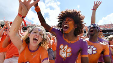 CLEMSON, SC - SEPTEMBER 01: Clemson Tigers fans raise four fingers prior to the start of the fourth quarter of the Tigers' football game against the Furman Paladins at Clemson Memorial Stadium on September 1, 2018 in Clemson, South Carolina. (Photo by Mike Comer/Getty Images)