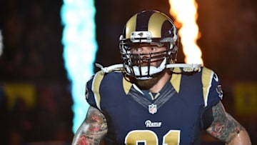 Sep 13, 2015; St. Louis, MO, USA; St. Louis Rams defensive end Chris Long (91) runs on to the field before the game between the St. Louis Rams and the Seattle Seahawks during the first half at the Edward Jones Dome. Mandatory Credit: Jasen Vinlove-USA TODAY Sports