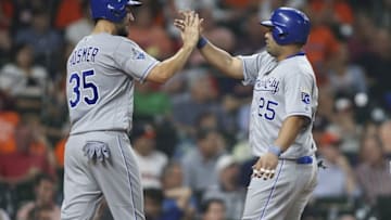 Apr 11, 2016; Houston, TX, USA; Kansas City Royals designated hitter Kendrys Morales (25) celebrates with first baseman Eric Hosmer (35) after hitting a home run during the eighth inning against the Houston Astros at Minute Maid Park. Mandatory Credit: Troy Taormina-USA TODAY Sports