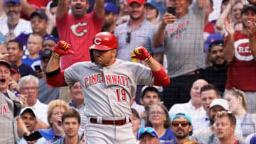 Jul 28, 2021; Chicago, Illinois, USA; Cincinnati Reds first baseman Joey Votto (19) gestures as he crosses home plate after hitting a home run against the Chicago Cubs during the second inning at Wrigley Field. Mandatory Credit: David Banks-USA TODAY Sports
