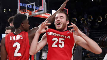 Dec 20, 2016; Atlanta, GA, USA; Georgia Bulldogs guard Jordan Harris (2) and forward Kenny Paul Geno (25) celebrate their win against the Georgia Tech Yellow Jackets at McCamish Pavilion. Georgia won 60-43. Mandatory Credit: Jason Getz-USA TODAY Sports
